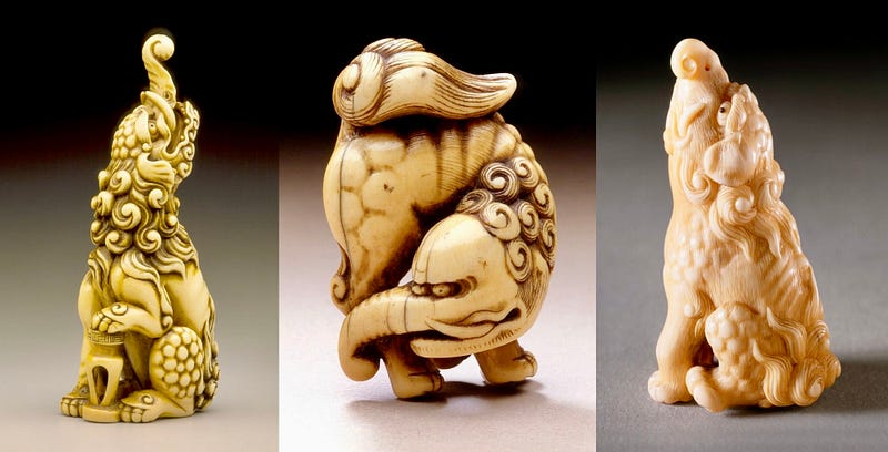 Small ivory carvings of baku in 3 different poses.