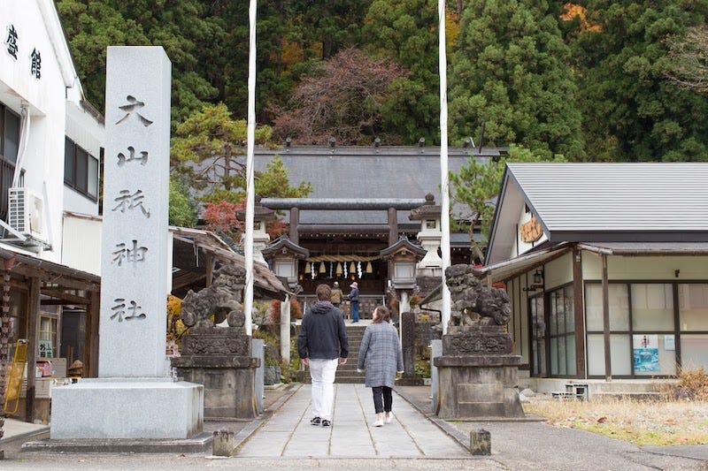 Donny Kimball and a representative from Fukushima Today visit Oyamazumi Shrine in Nishi-Aizu
