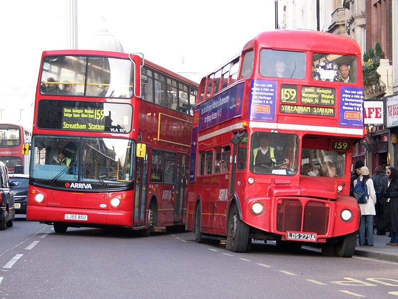 London’s iconic red buses. Photo from Wikipedia by Jon Bennett