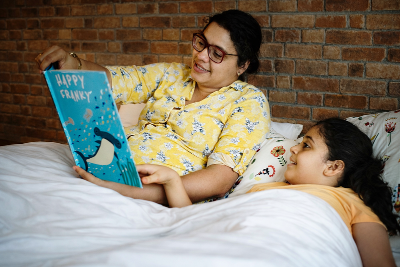 “Parent helping child tell their story — name it to tame it parenting strategy”