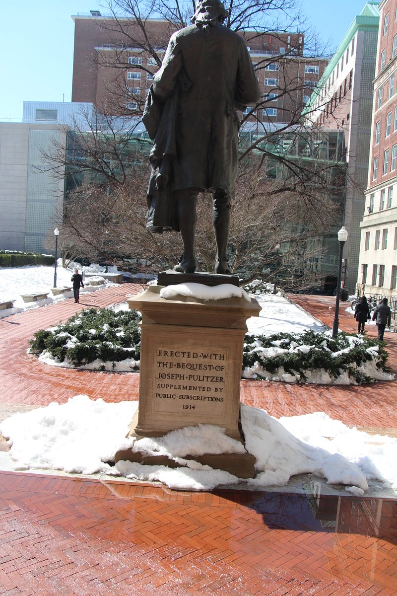 Joseph Pulitzer statue outdoors, Columbia University.