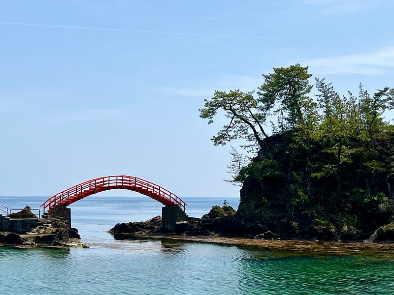 Arched bridge between islands near Shukunegi, Sado Island.