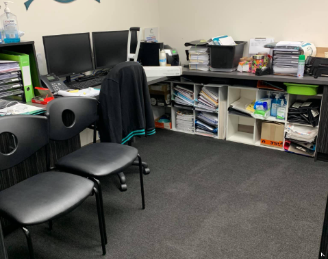 Team of professionals delivering the Best Office Cleaning Services in a modern corporate office