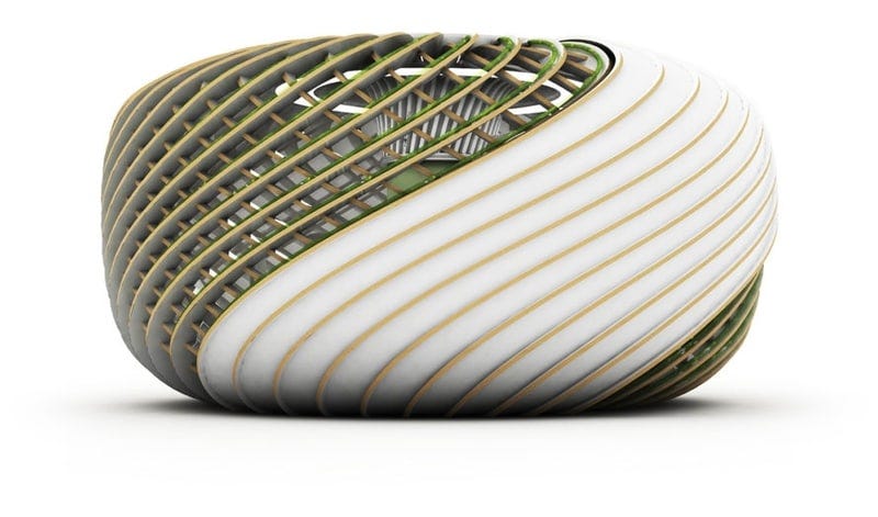 A tech pod for socialising. It is a cylindrical structure with a curved top and bottom and thin, gold stripes curving diagonally around it. The stripes on the right hand side have white Teflon between them. The stripes on the left hand side have gaps between them so you can see a tall green structure on the inside.