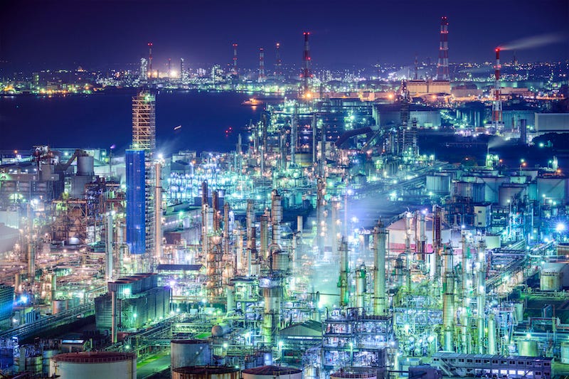 The factory-filled nightime skyline of Mie Prefecture’s Yokkaichi