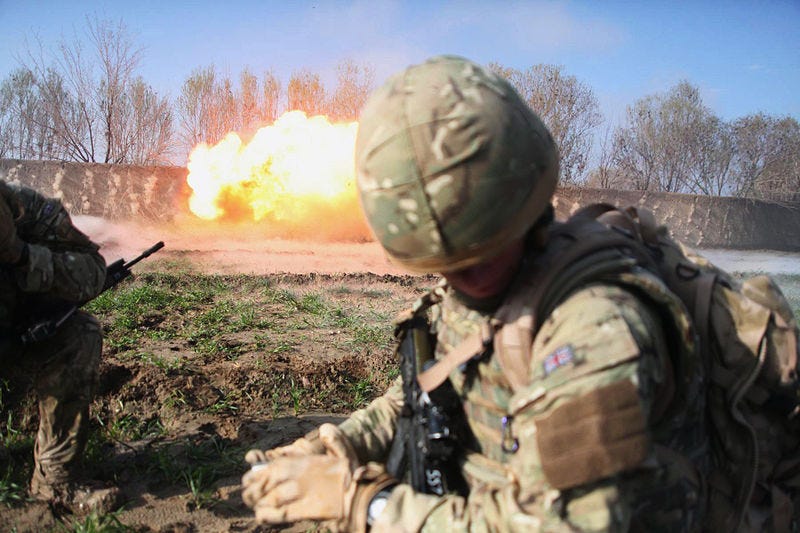 A soldier detonates an explosive device in Afghanistan.