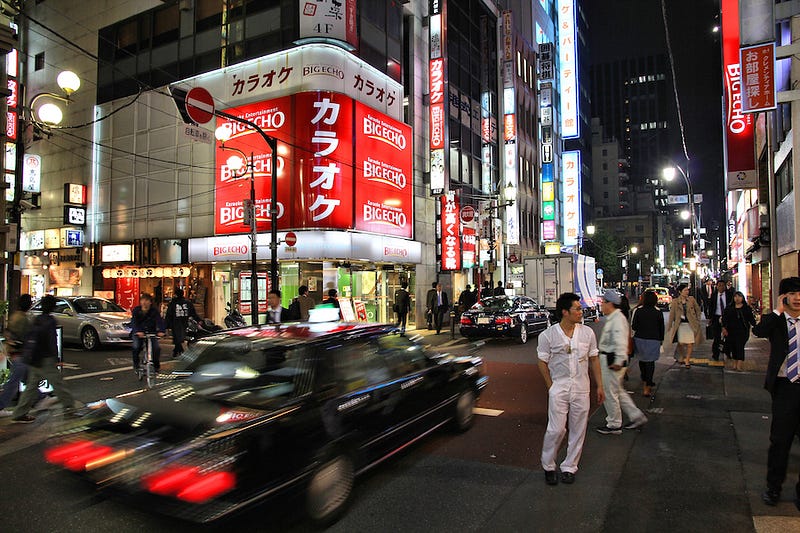 People head to karaoke in a taxi after an epic night of partying in Japan