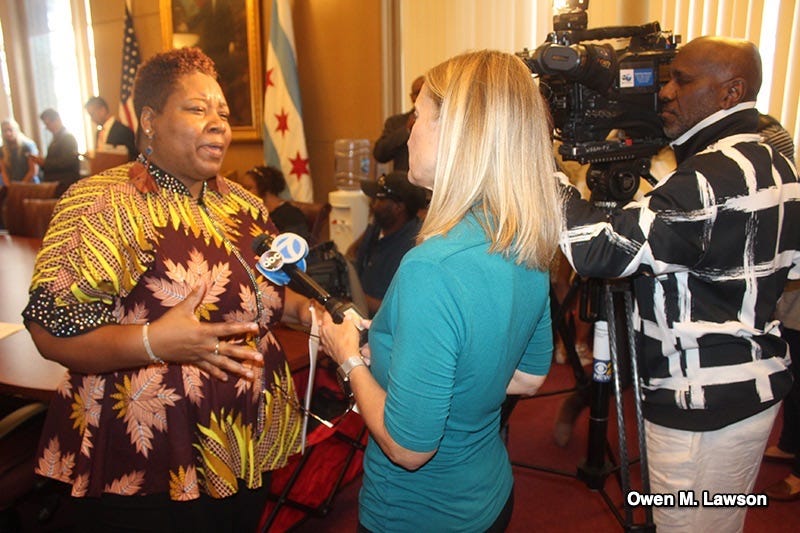 Brand new Ald. Jeanette Taylor (20th) speaks to news media after making an announcement at City Hall. Photo by Owen Lawson