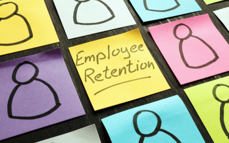 employee-retention-sign-and-figurines-on-the-memo-sticks