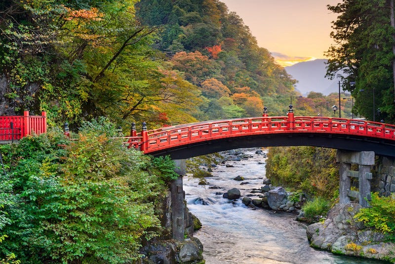 Nikko’s iconic Shinkyo Bridge spans the rushing waters of the Daiya River