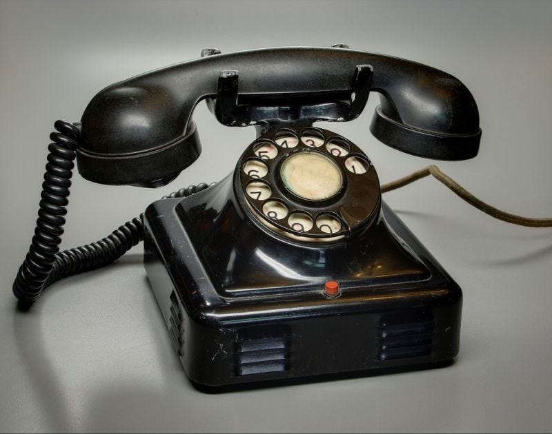 A telephone (the horn, blower etc.)