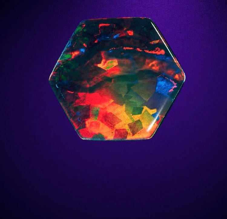 A dark holo gem you can mine for in Illuvium.