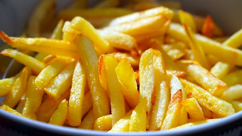 French fry chips in a white plate