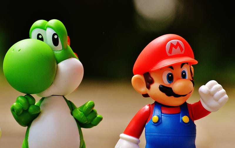 Mario and Yoshi standing on a desk