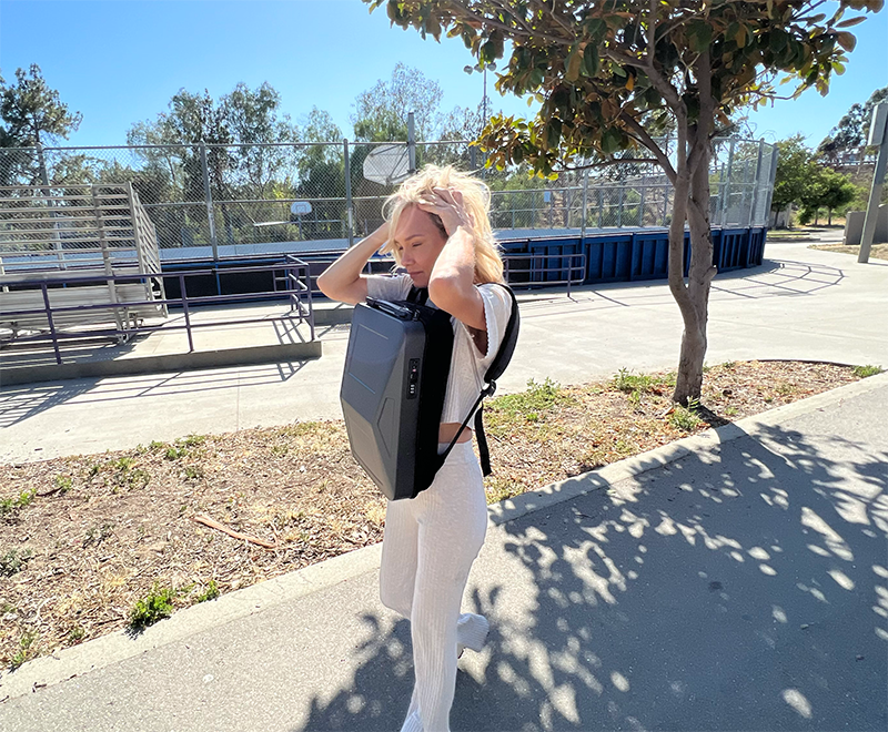 Girl carrying the Cyberbackpack in the front position
