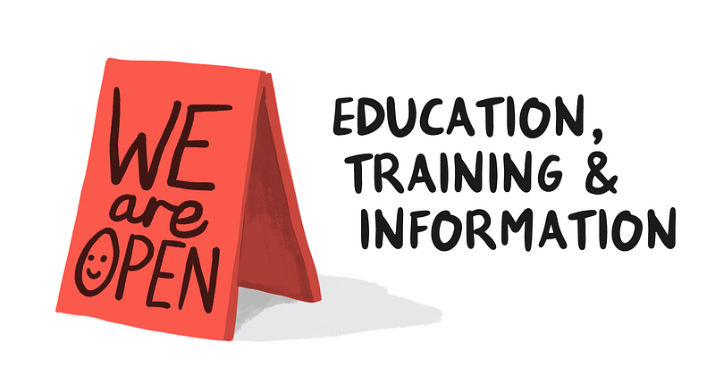 A red A-frame sign similar to one that might be found outside outside a shop. “We Are Open” is written on the sign in black letters. The “O” in Open is a smiley face. “Education, Training & Information” is written in black capital letters to the right of the red sign.