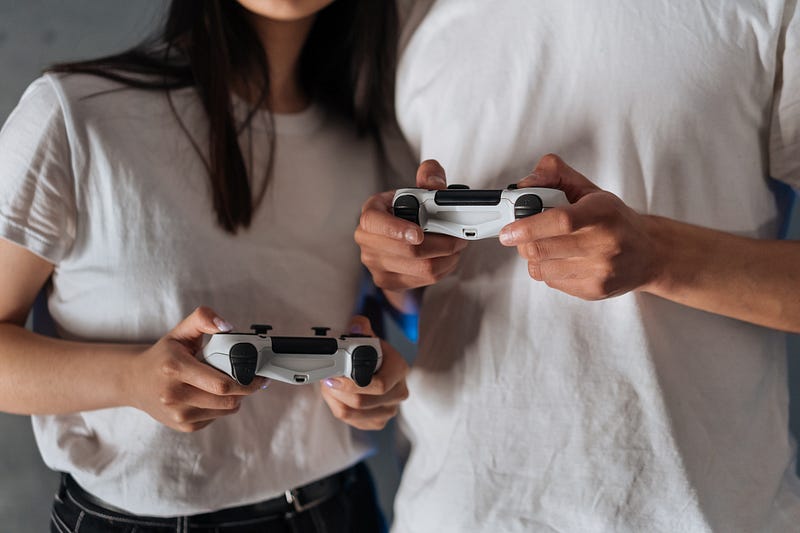a man and a woman playing PlayStation 5