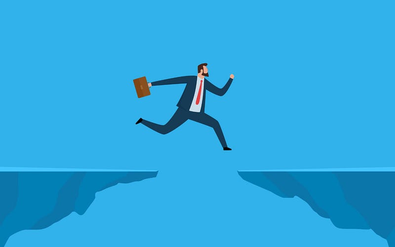 Graphic of a business man jumping across a gap with a briefcase