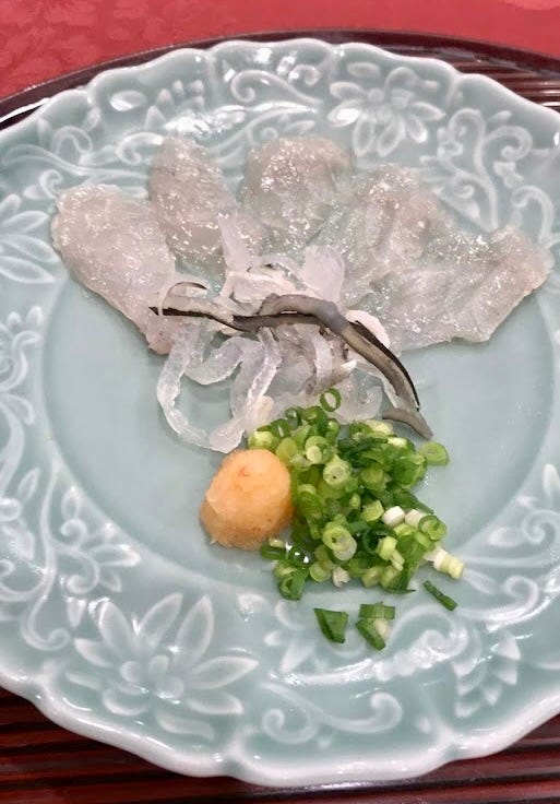 Raw pufferfish with chopped green onions and citrus is, to me, an exotic food.