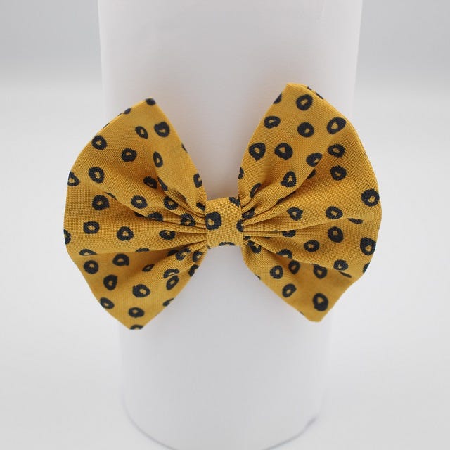 baby hair accessories australia in spots in gold print