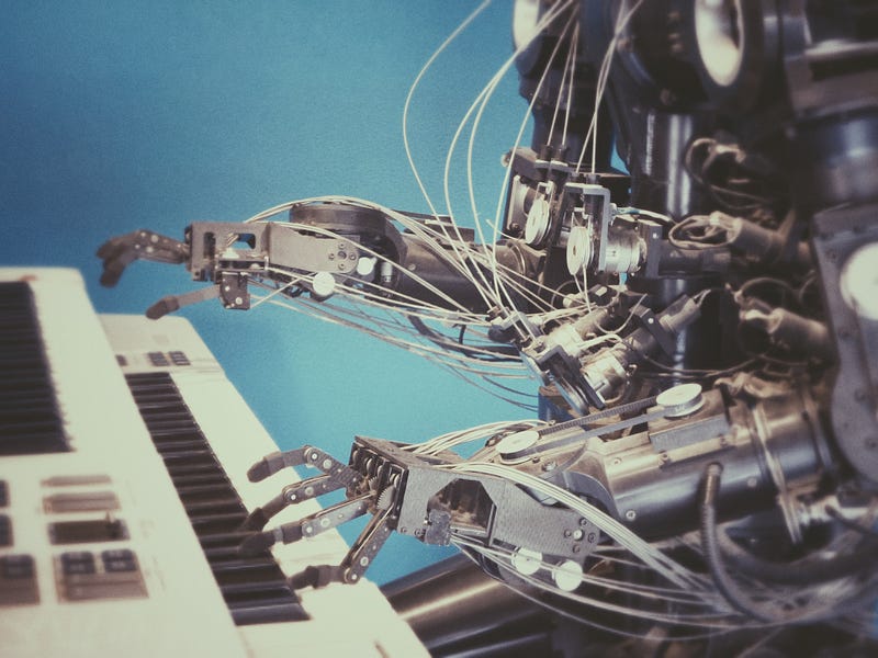 A robot playing piano.