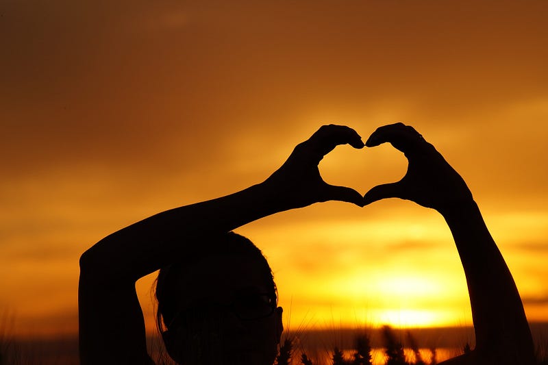 Hands making a heart shape.