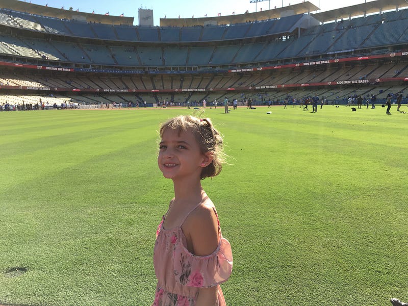 girl in dodger stadium outfield