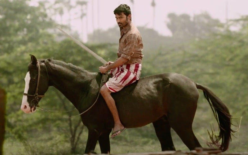Dhanush riding a horse in Karnan