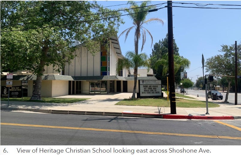 The front of a church is on a street corner. Caption states: “6. View of Heritage Christian School looking east across Shoshone Ave.”