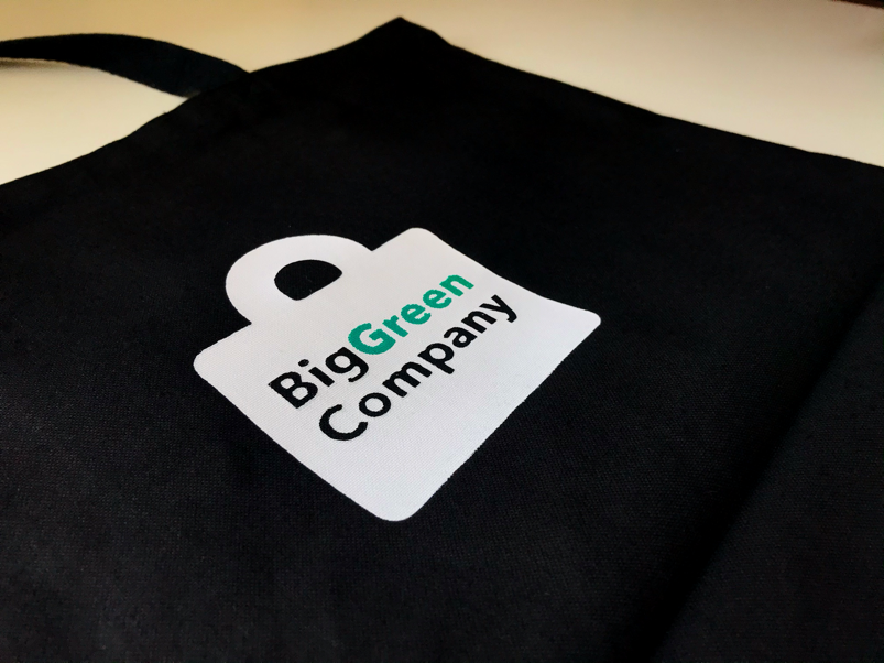 Returnable bag with big green company logo