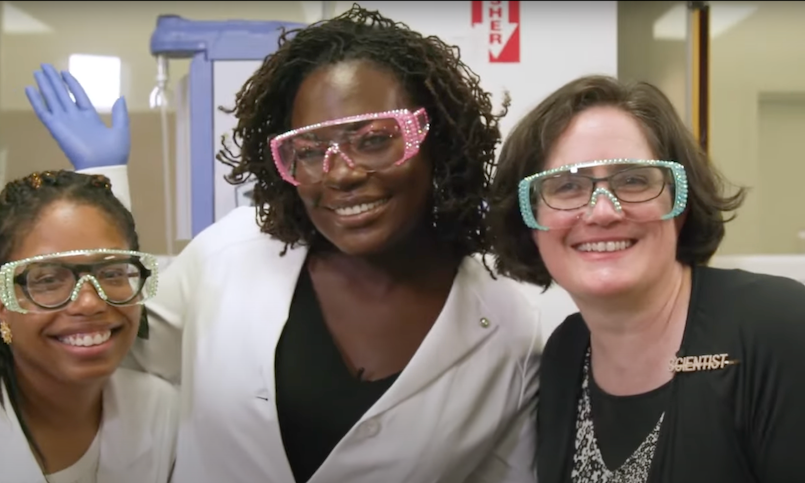Image from #NerdyJobs S1E1: Exploring the Magic of Protein Crystallization with Dr. Raven the Science Maven! (https://www.youtube.com/watch?v=siFfzoFv61I). Pictured: Dr. Raven Baxter, Sydney Anderson (Ohio State University, 1st year biomedical engineering PhD student), and Prof. Sarah Bowman. Reprinted with permission from Dr. Raven Baxter.