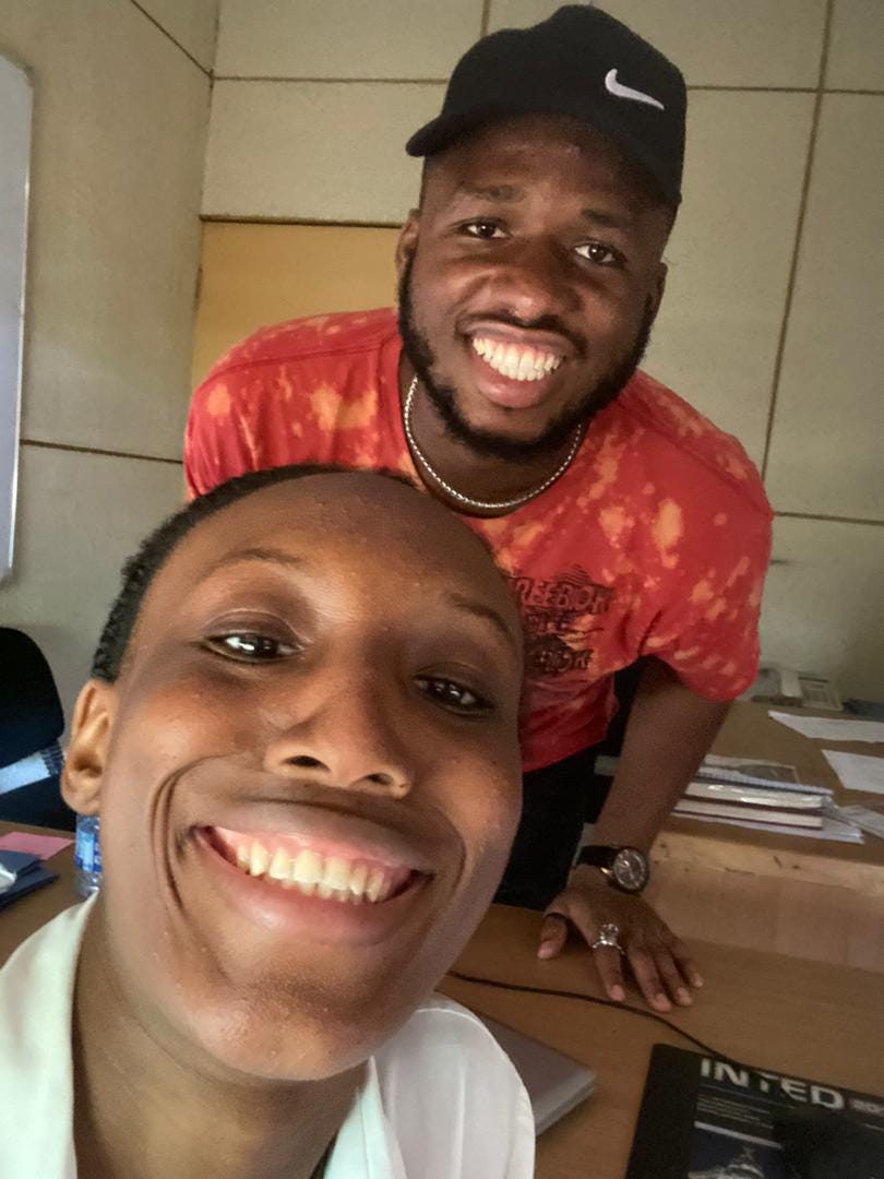 A picture of me and James in my office.