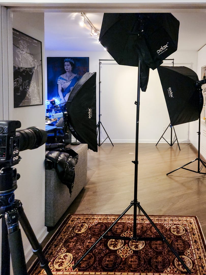 camera and lighting setup in a home photo studio