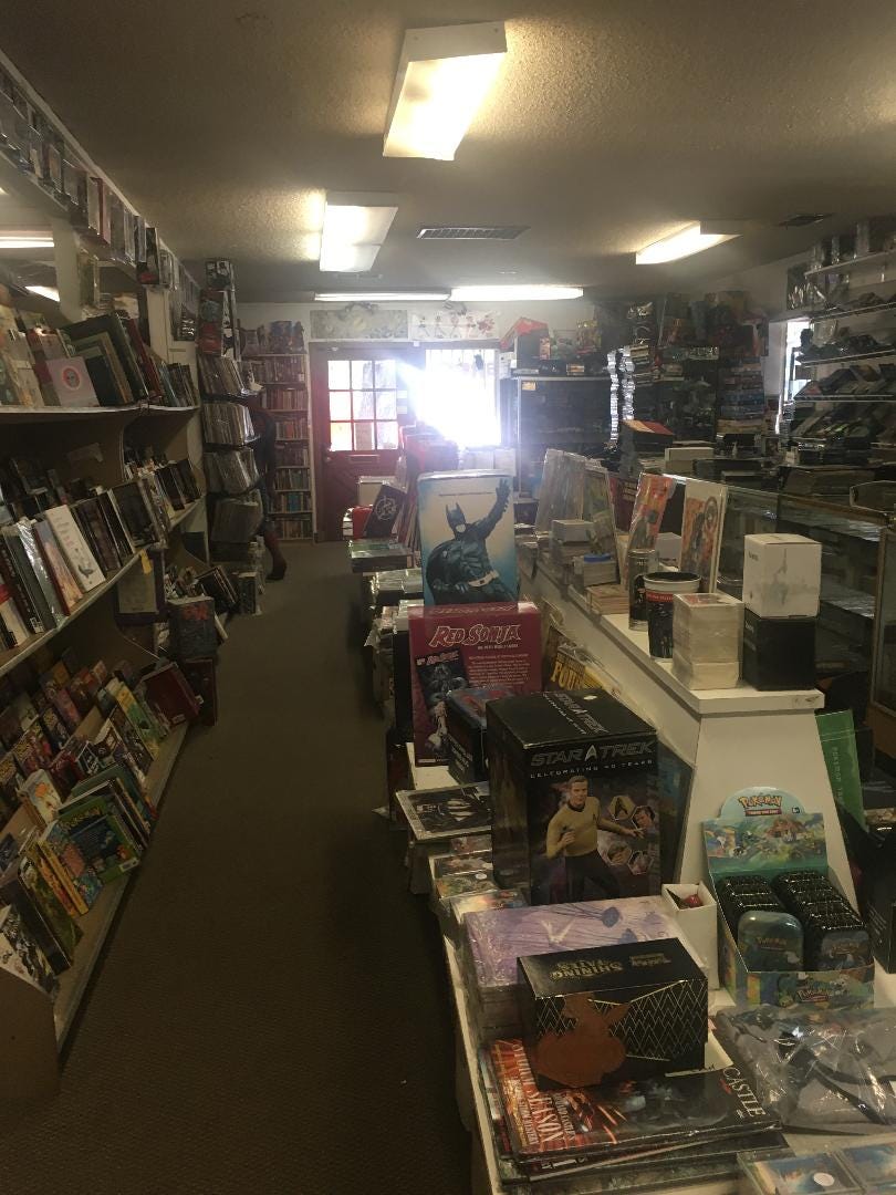 Photo showing inside of Bizarro World comic book store.
