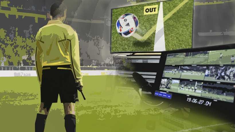 Referee analysing video footage of an incident in the match