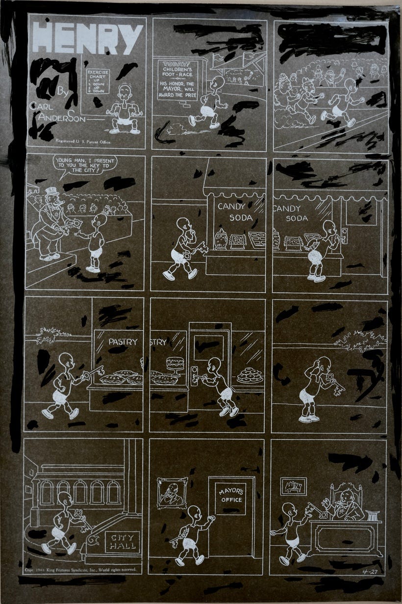 Photo of a proof of comic strip Henry in a reversed-out (white on black) style on a kind of slick paper, likely photographic