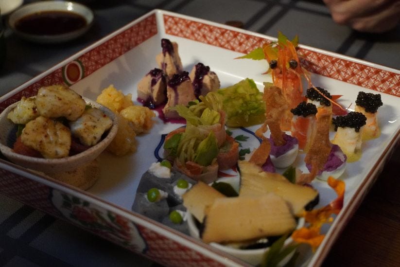 Starter Platter with Foie Gras, Sashimi, Rice Balls, and More at Totoraku
