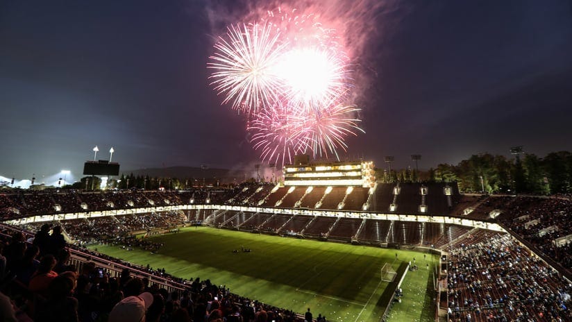 Fireworks illuminate the night sky in Stanford Stadium