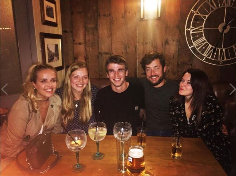 Alex Innes with Lucy and friends in a pub