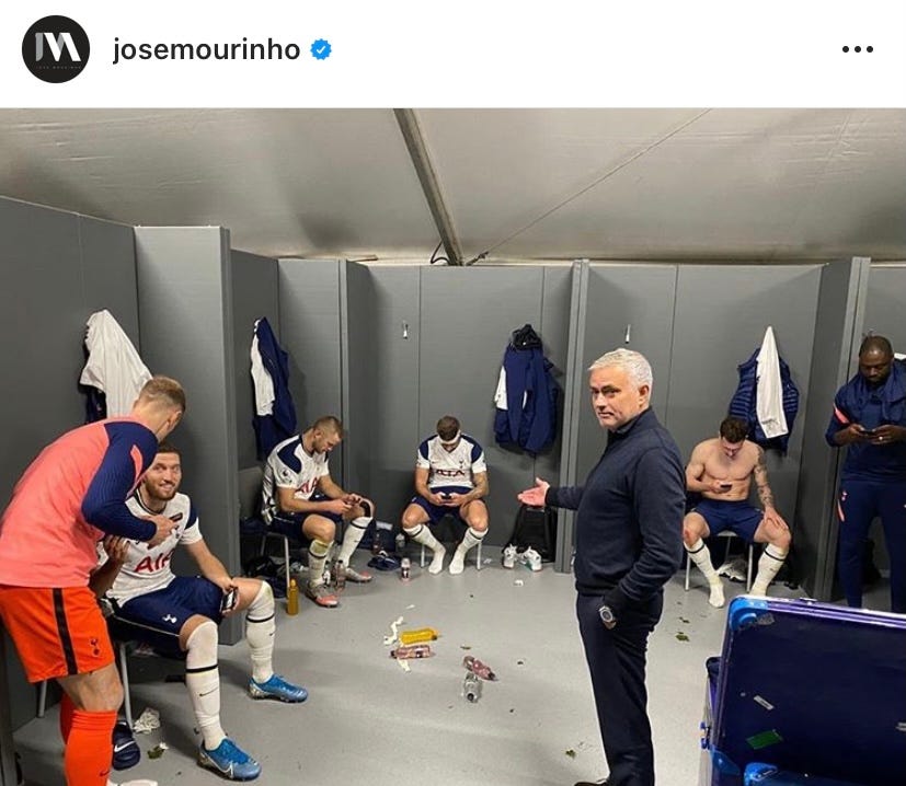 Tottenham players on their phones after a football match