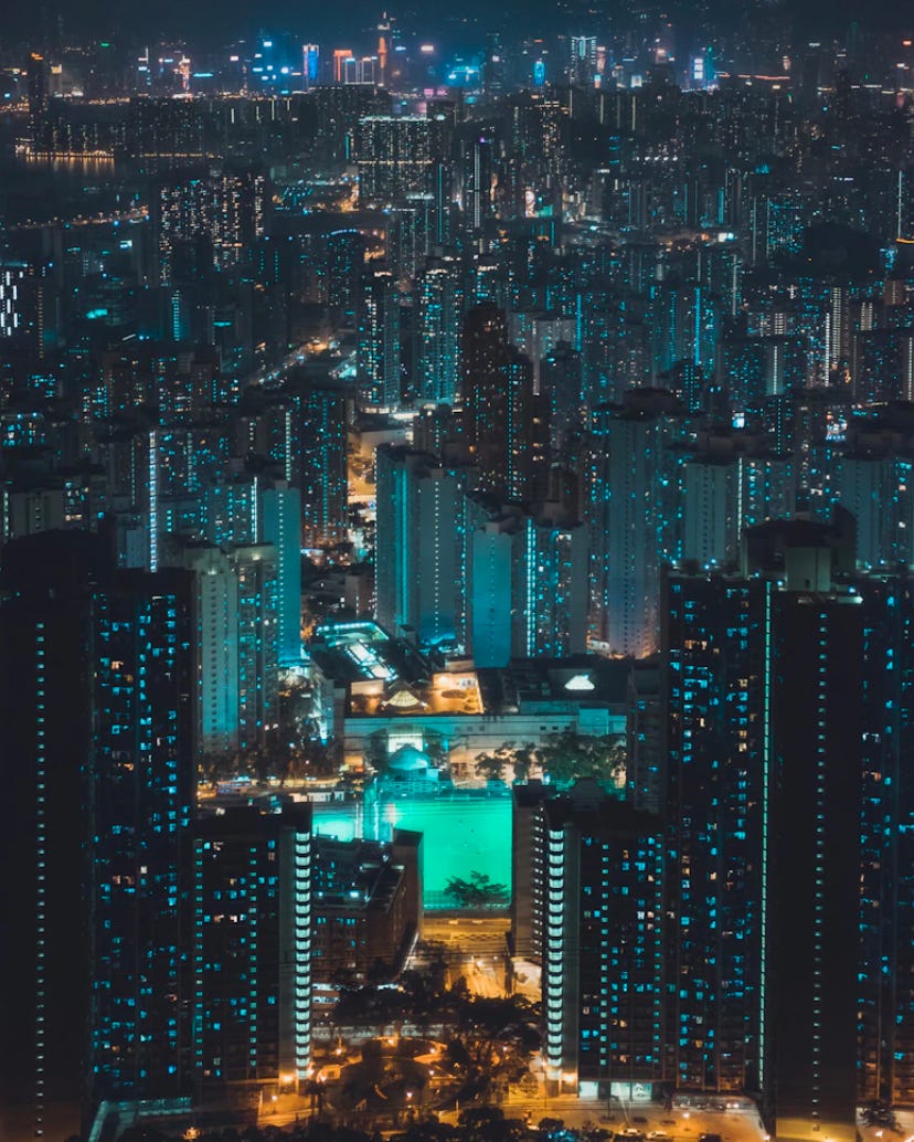 Aerial view of city buildings during night tome
