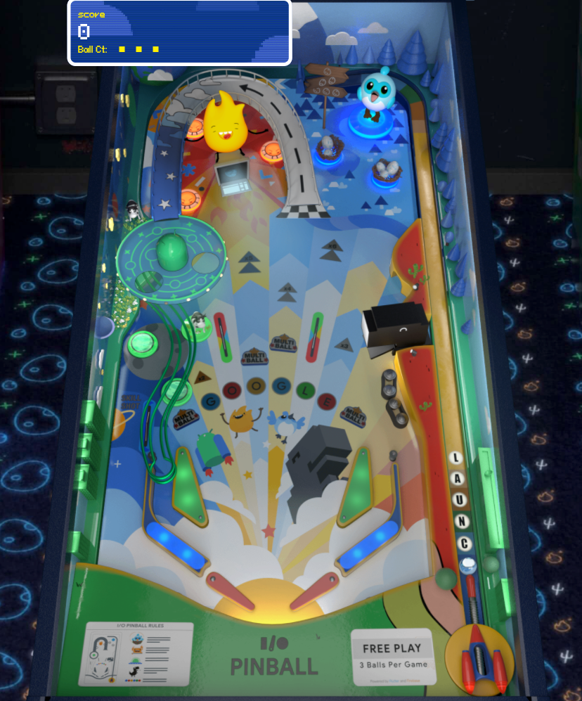 I/O Pinball playfield featuring Flutter’s Dash, Android Jetpack, Chrome’s Dino, and Firebase’s Sparky, and other Google-themed elements. Toward the bottom of the board there are two flippers with two bumpers above and to the bottom right is the ball ready to be launched.