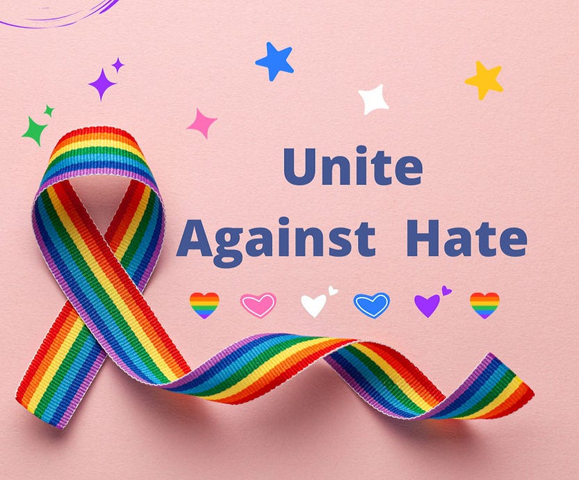 “Unite Against Hate” on a pink background with rainbow hearts and ribbon