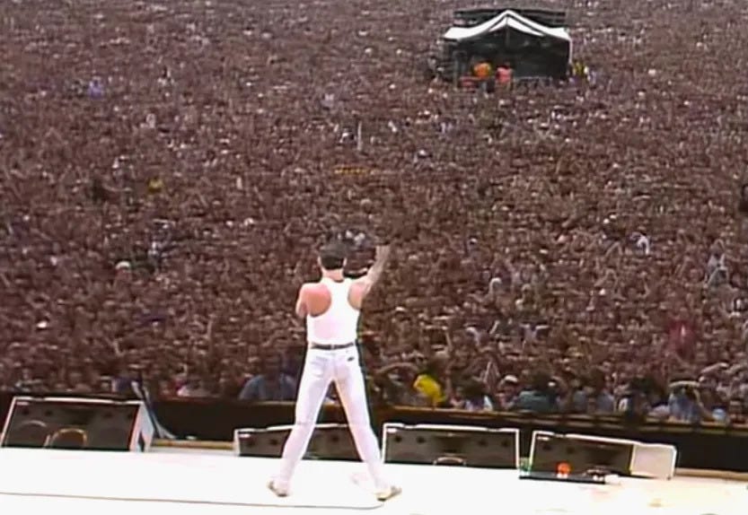Freddie Mercury, singer for Queen, on stage at Live Aid in London, July 1985. Photo: YouTube