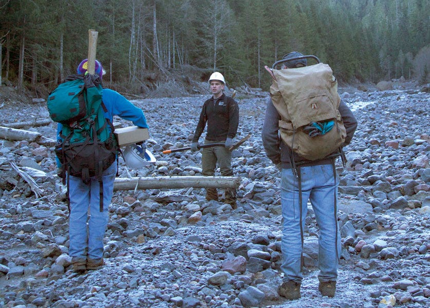 Daniel Probst talking with others during 100-mile race in Bellingam area