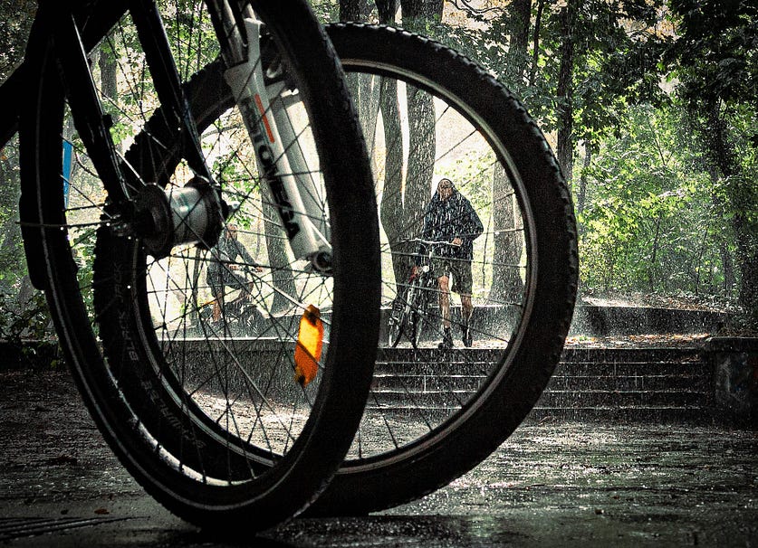 Müggelsee, Berlin in the rain. Copyright; Sean P. Durham, 2022. Bike wheels and rain