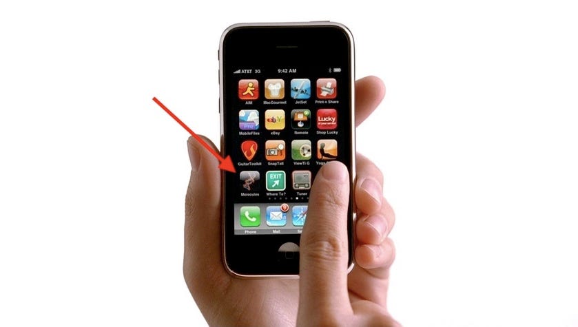 A frame from one of the original iPhone 3G ads, showing the icon for Molecules on the home screen.