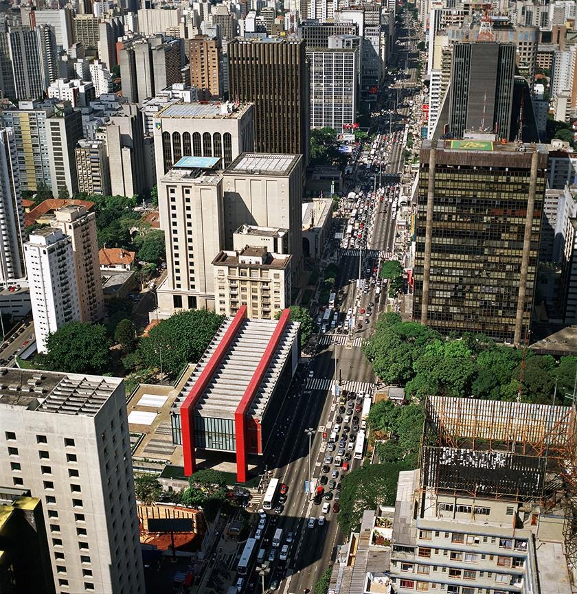 The museum’s elevated position grants views over the Paulista neighborhood. The two conspicuous beams were painted crimson re