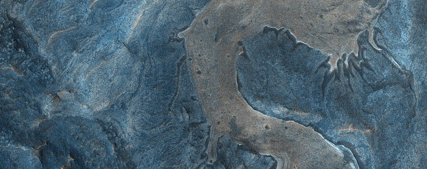Dragon-Like Patterns on Mars: The Enigmatic Terrain of Southwestern Me Dragon-Like Patterns on Mars: The Enigmatic Terrain of Southwestern Me