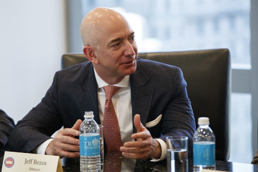Jeff Bezos leading a meeting